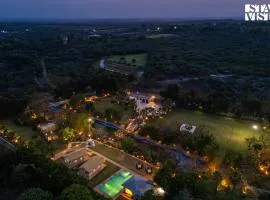 StayVista at Kaimalgarh Aravalli Estate with Pool & Lake View