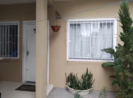 EM CASA