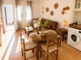 Can REMIGI Casa Rústica con Patio Privado y Aire Acondicionado