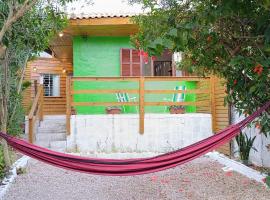Casa tranquila na Praia da Ribanceira à 850m do mar - AMarADuna – hotel w mieście Imbituba
