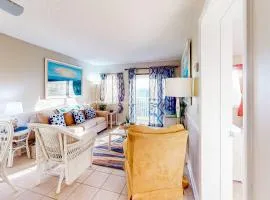 Gulf-front condo with pools hot tub fitness room dry sauna & beach access