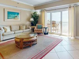 Spacious condo with Gulf-front views & access to pools hot tub gym
