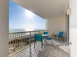 Spacious beachfront condo with full kitchen shared pool and beach access