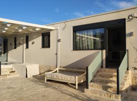 Bungalow Thalassa, am Strand und mit Mini-Pool, hotel en Kalamaki
