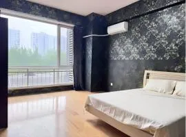 Beijing CBD area - Cozy family suite with queen bed and city view
