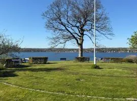 Bondegård med havudsigt