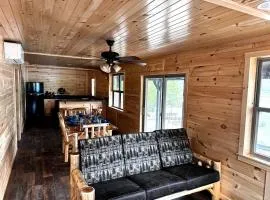Charming Lakeside Cabin on Big Moose Lake with Breathtaking Views for a Memorable Getaway in New York