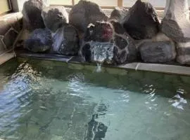 庭付き源泉かけ流し温泉宿