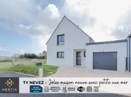 TY NEVEZ - Jolie maison neuve avec petite vue mer