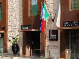 El Homs Palace Hotel, hotel Comisóban