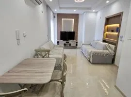 Residence Costa pied dans l'eau