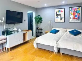 Apartament Tęczowy Tukan