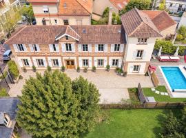 Villa Avril et Spa Gîte de luxe 15 personnes avec piscine chauffée toute l'année, hotel en Sélestat