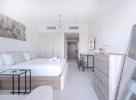 Free housekeeping visits during your stay - StayShort - Damac Hills Sleeps 2 with Balcony