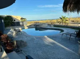 Sunny Poolside Escape Near the Beach