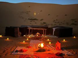 Gambi Camp, hotel en Hassilabied