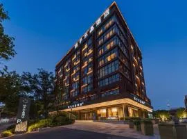 Orange Crystal Hotel Qingdao Taidong Pedestrian Street