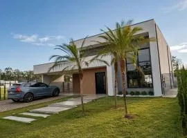 Casa Térrea com Piscina em um Resort Completo