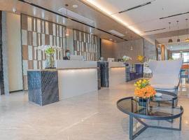 Echarm Hotel Zigong Machishui Wanda Plaza, hotel v mestu Shuping