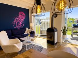 Ferienhaus Fischkopf mit Sauna und Strandkorb, Hotel in Büsum