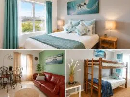 Family-Friendly 2BR Near Airport Sleeps Groups Wifi Free Parking