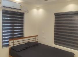 Sunny Hotel, hotel i Kollam