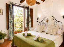 Casa amb terrassa i vistes a la vall - Cal Taverner, hotel en Montsonís