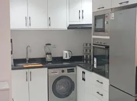 Chic appartement calme à une minute à pied de la plage