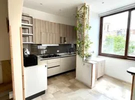 Private terrace with a view of the bell tower of a historic residence
