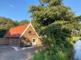 Boerderijhuisje 22 - Landelijk logeren bij Sneek, hótel í Loënga