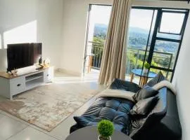 Poolside stay with city view & free parking