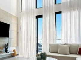 ELLI Azure Loft & 2-Floor Boho Duplex with Rooftop Terrace & Infinity View