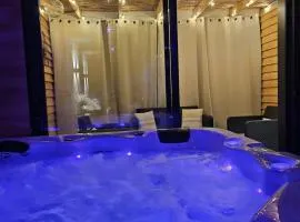 Suite privative avec jacuzzi et espace détente