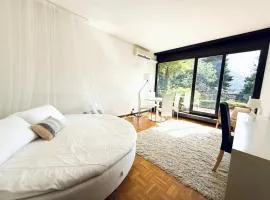Oasi con Giardino e Parcheggio in centro Lugano