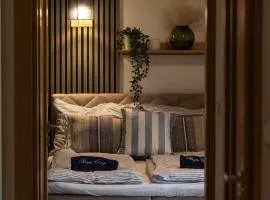 Domki i Apartamenty Poezja Ciszy Dębki