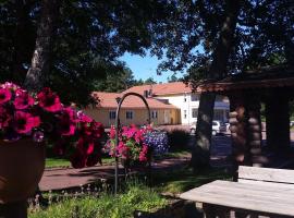 Bastö Hotel & Stugby, hotel in Pålsböle
