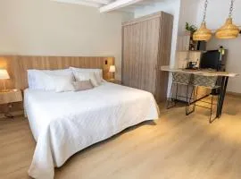 Live in a modern loft in central Belén, AC