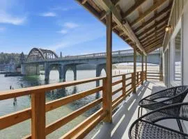 Incredible Riverfront Oasis with Wraparound Deck & Cozy Interior