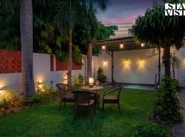 StayVista at House of Palm with Bonfire & Pool