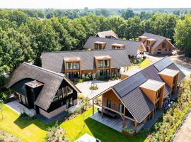 Veluwe Villa met Wellness en Binnenzwembad, hotel u gradu Wekerom
