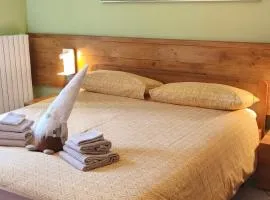 Bernina Express Apartment Il cuore di Lara e Stefy right in front of the train station, with garden and free parking