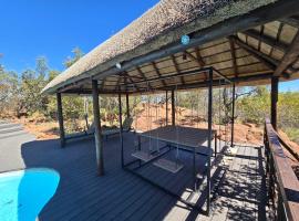 Milkwood Safari Lodge, hotel Warmbathsban