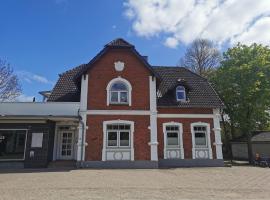 Familie Hensen - FeWo mit überdachter Terrasse im Ortskern von Tarp, hotel em Tarp