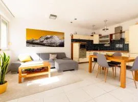 Spacious Apartment with Balcony - Private Garage Parking
