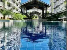 212B Amani Grand Resort Residences near Mactan Airport with pool, gym, wifi, netflix