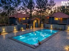 StayVista at The Boho Hideaway with Shared Pool, BBQ and Bonfire