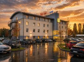 Viesnīca First Inn Hotel Paris Sud Les Ulis pilsētā Lezjulīza