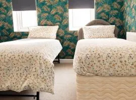 Twin single bedroom perfect for contractors and football fans