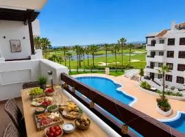 DAINA BLISS - Golf & Sun Apartment
