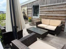 Knus houten huisje bij het bos